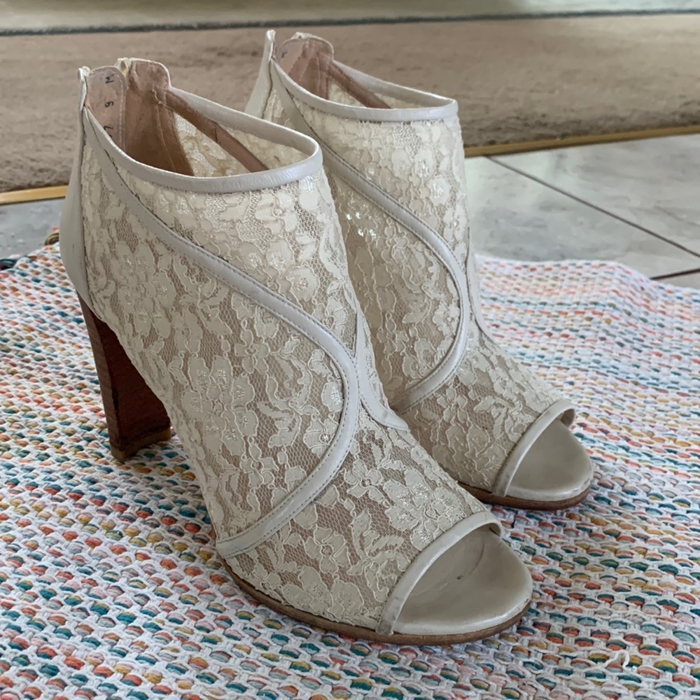 Lace open toe booties by Stuart Weitzman